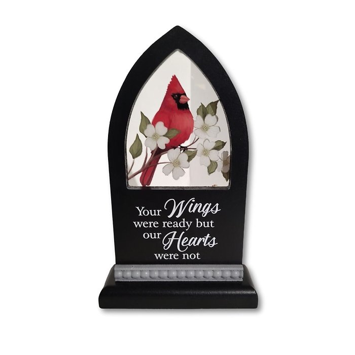 small black window with a red bird