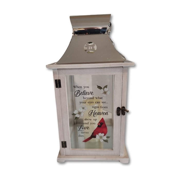 Wood and silver lantern with words